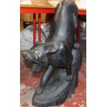 A carved wooden panther, 80cm high approx.