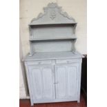 A painted chiffonier the superstructure with shelves and drawers and cupboard below 100cm wide