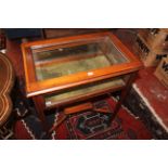 An Edwardian mahogany display table 62cm wide