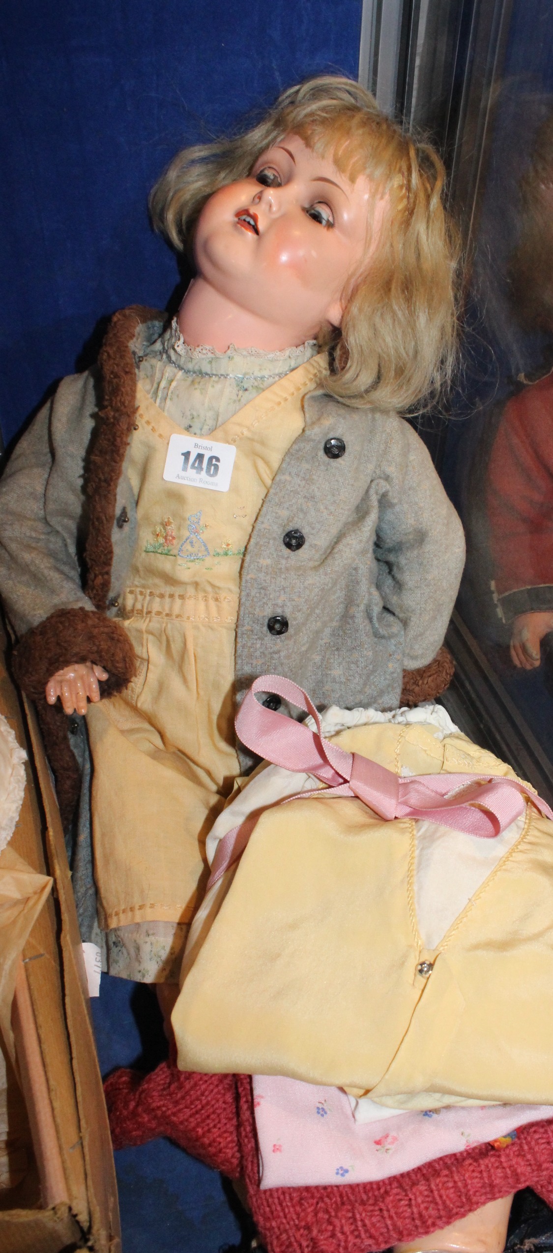 A 1930's German () bisque head doll Mary - Lou with indistinct marks to the head in her original