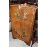 A Chinese lacquered cocktail cabinet and a Chinese low table