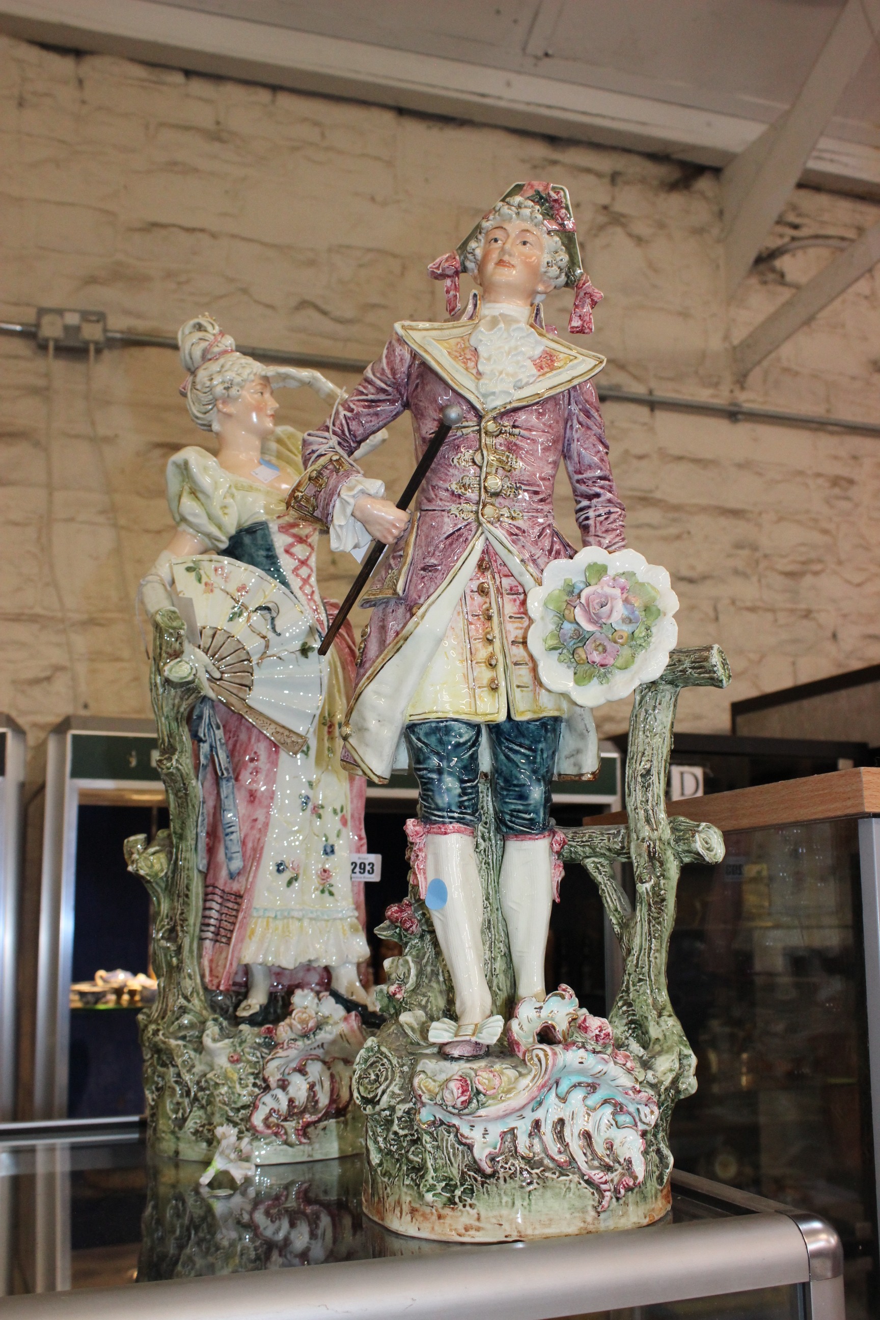 A pair of continental figures, circa 1900, 69cm high approx.