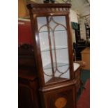 A Gothic design corner display cabinet