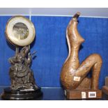 A Scandinavian wooden sculpture of a lady, signed O Pierre to underside, 35.5cm high