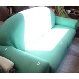 A green upholstered two seater sofa