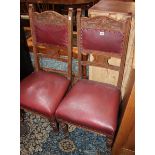 A pair of Edwardian velum covered oak chairs