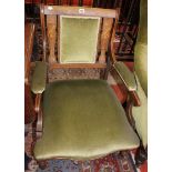 An Edwardian armchair with musical instrument inlay