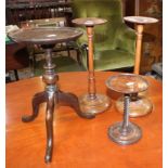 A pair of mahogany candlesticks another with spiral column and kettle stand