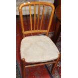 A set of six beech dining chairs