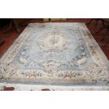 A large Chinese rug, approx 310 x 250cm