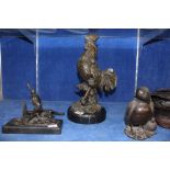 A modern bronze cockerel, a French bronze woodcock with losses, a resin puffin and a equestrian