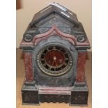 A Victorian slate mantel clock with French eight day movement.