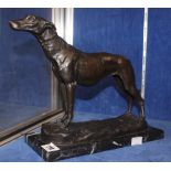 A modern bronze of a greyhound on a plinth base, 26cm wide