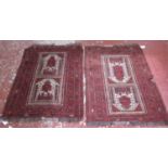 A pair of prayer rugs