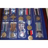 MEDALS A collection of twenty one reproduction medals from the USA, including Legion of Merit,