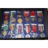MEDALS A collection of twenty four reproduction service medals mainly from Poland, including a