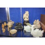 Assorted jade and soapstone to include two jade birds, lotus leaf dishes, a jade elephant, soapstone