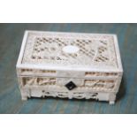 A 19th Century Chinese ivory box, pierced decoration, 9cm wide