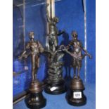 Three bronzed figural sculptures