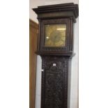 A Victorian oak longcase clock with brass face inscribed ‘Donisthorpe, Normanton’