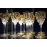 A suite of gilded Venetian glassware, eleven Champagne, thirteen white wine, twelve red wine and