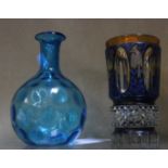 Three pieces of glassware to include a Mary Gregory style vase (3)