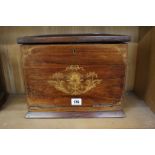 A mahogany inlaid writing box, with fold down writing slop, hinged lid, stationary compartments,