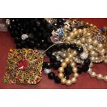 A collection of costume jewellery, including bracelets; beaded necklaces and other items