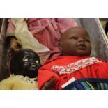 An Indian young girl doll, possibly Annette Himstedt and two baby dolls (3)