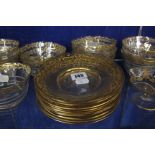 A suite of gilded Venetian glass ware, twelve bowls, ten plates, four punch glasses, four small
