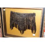 Two framed costume pieces, black and sequined