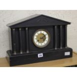 A 19th Century French slate Palladian mantel clock with six columns bearing the name W. Margrett