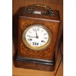 A French mantel clock mahogany cased with satinwood marquetry, bearing the makers name of Breguet,