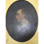 An oval head and shoulders portrait of a man, side profile, 46cm 34cm