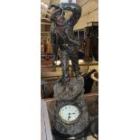 A metal clock with sailor throwing lifeline of sinking vessel, titled 'Rescue to base' 64cm high