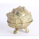 [Tibet] A Tibetan Cast Brass Skull Shaped Two Part Incense Burner the relief moulded oval body