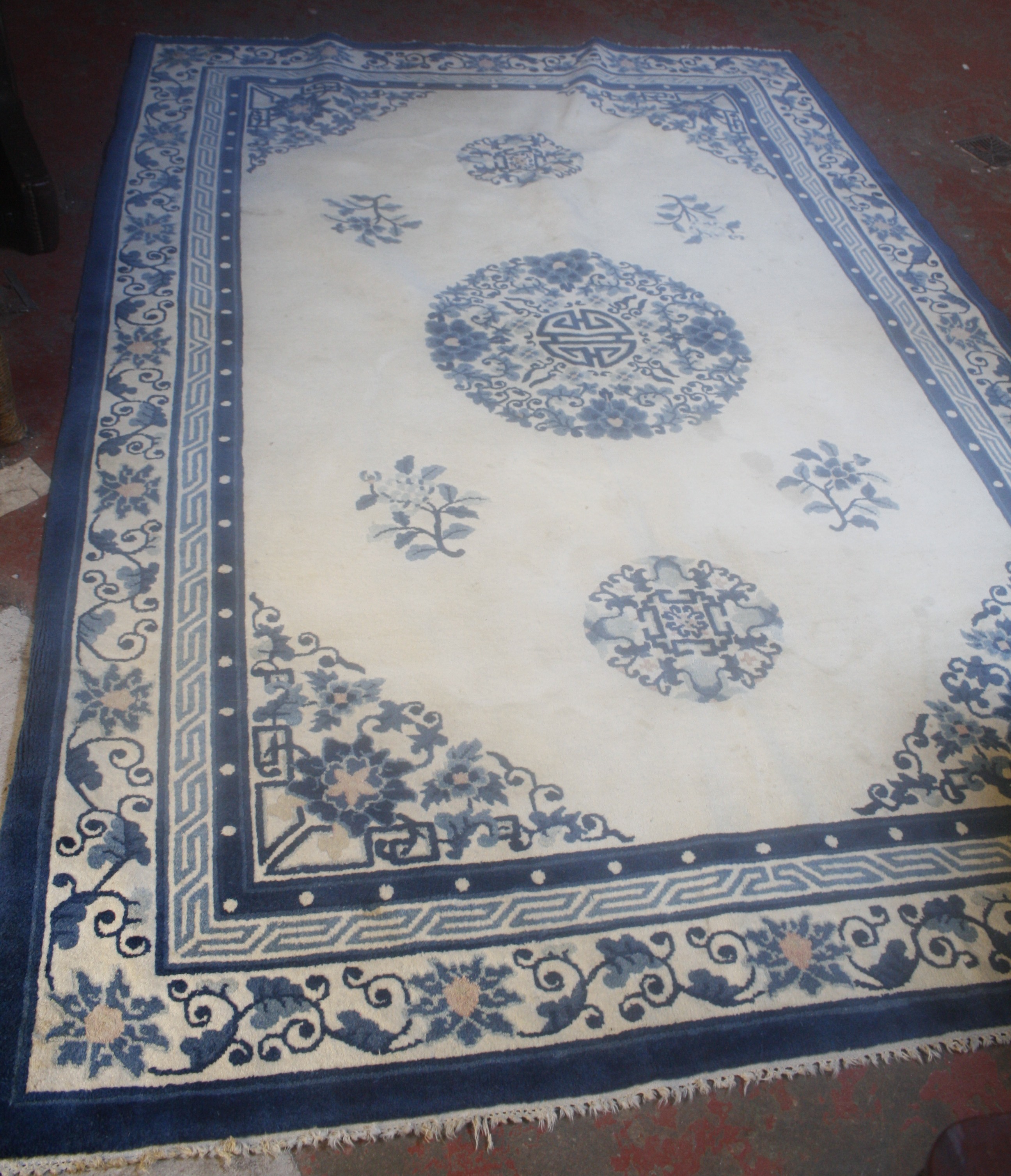 A Chinese rug, 180 x 270cm two Bokhara rugs, and a further Quashqai rug