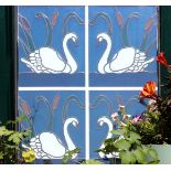 Pair of stained glass and leaded panels, decorated with swans amongst reeds, a pair, 69cm x 55cm