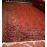 A Persian style red ground rug 370 x 270cm