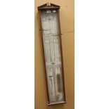 An 'Admiral Fitzroy Barometer' of typical form, mahogany cased, 102 cm high.