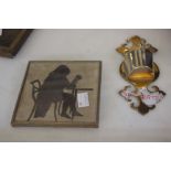 Assorted items including: a sewing basket, a pair of stone book ends, photograph frames etc