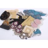 A collection of passementerie and trimmings, including: an early 20th century purse, woolwork and