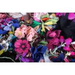 A collection of 1930s and 1940s felt corsage and millinery flowers, many having been made in the War