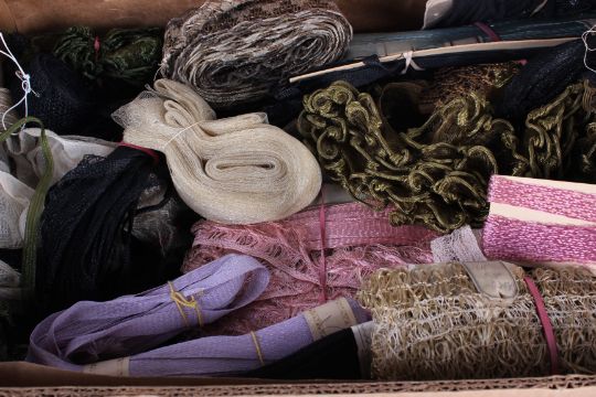 A large collection of early to mid-20th century millinery trimmings, hat trim and raffia, including: