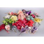 A quantity of silk and velvet corsage and millinery flowers, dating from the 1920s to the 1950s.