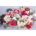 A collection of silk and velvet corsage and millinery flowers, dating from the 1920s to the 1950s.