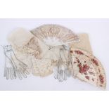 An early 20th century cream fringed shawl, a 19th century lace stole, a lace wedding veil,