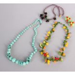 A 1940s/1950s Tutti-Frutti glass necklace; a pair of earrings in a similar style, a mauve and