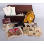 An old wooden box and contents, including: an early 20th century autograph book, photographs, lace