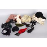 A collection of millinery items, including: hat felt off-cuts and trimmings, hat linings, hat